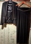 Conjunto de casaco, calças, saia e blusa 9